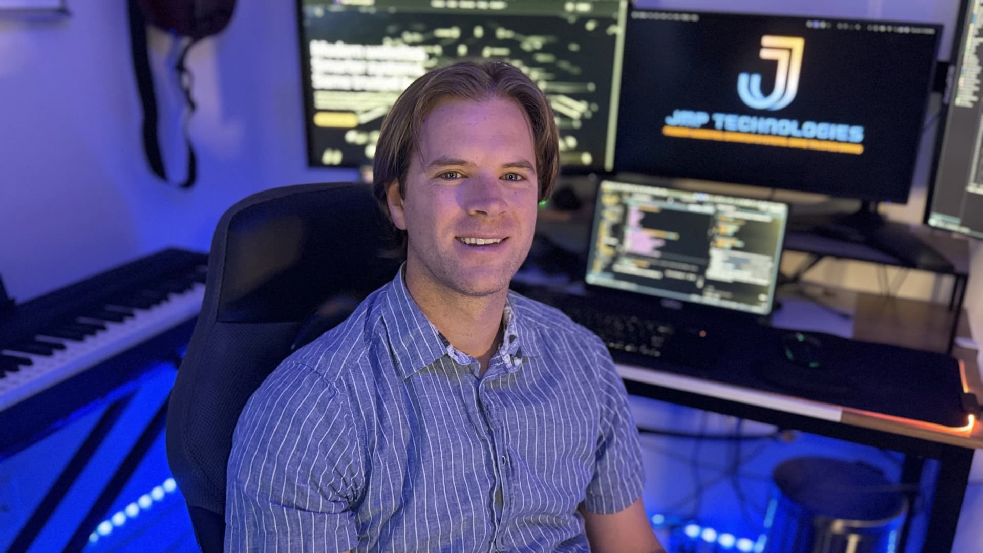 Wide shot of Jordan at the workspace